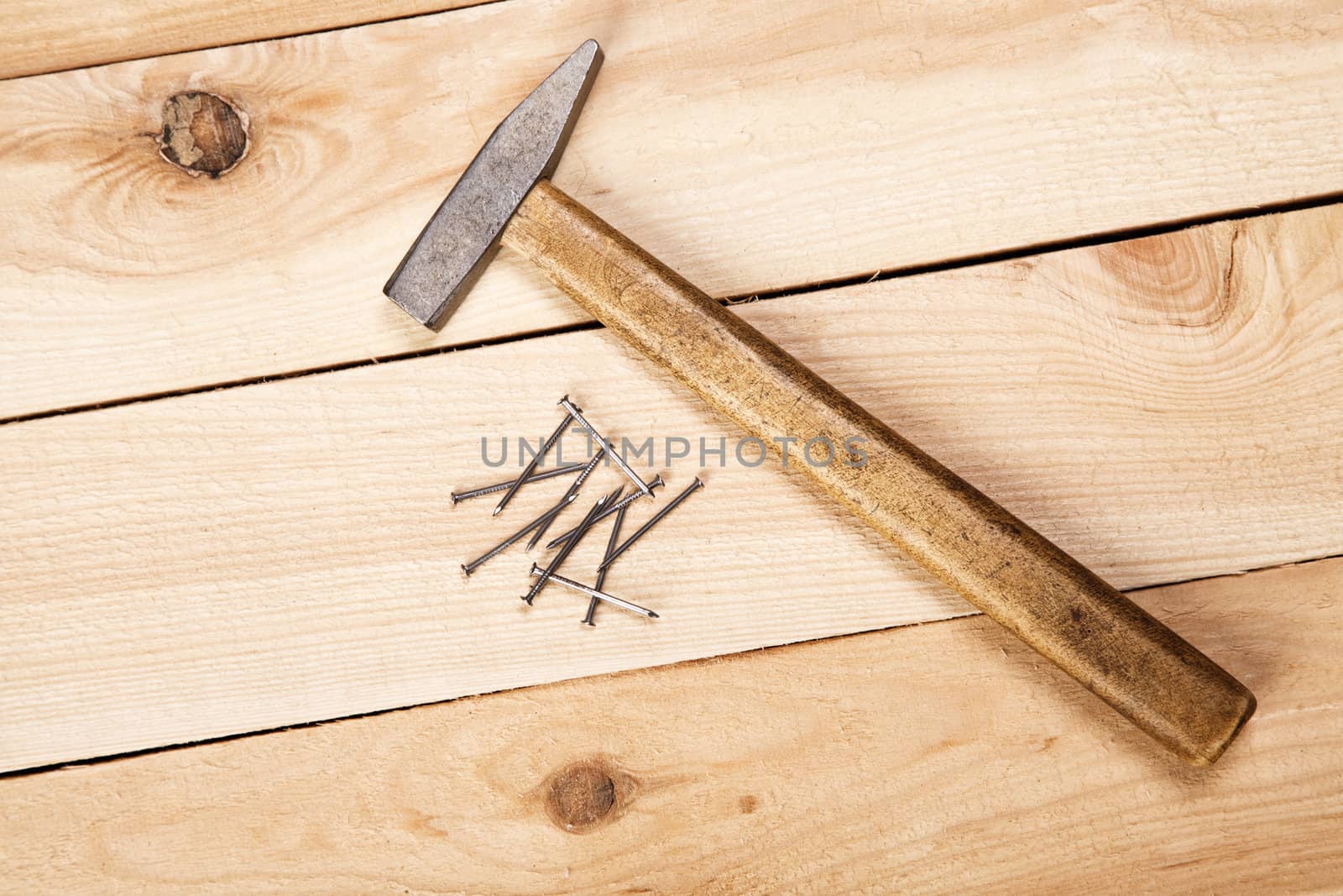 Carpenter's tools on pine desks, closeup photo