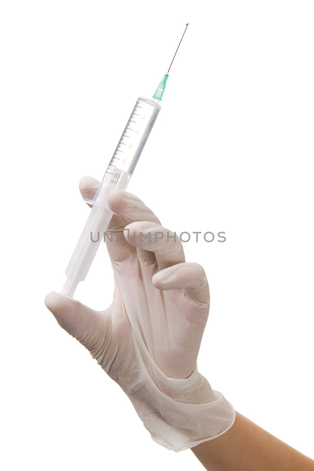 Nurse's hand holding a syringe, white background