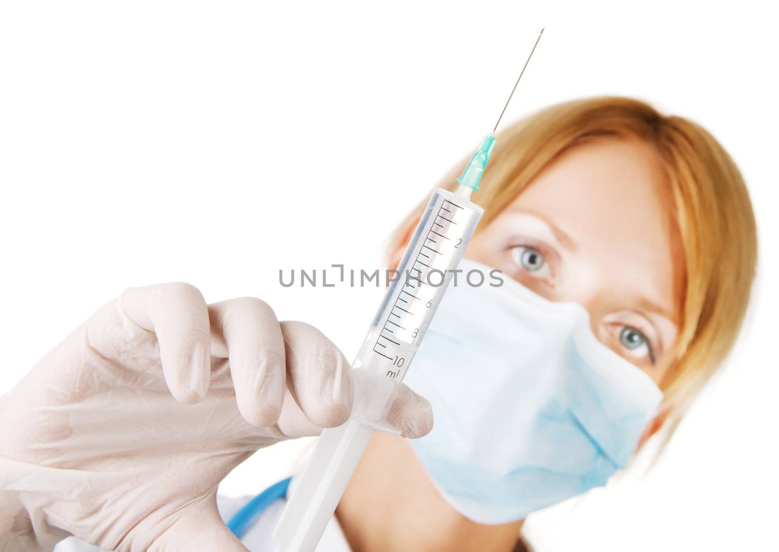 Young professional doctor holding a syringe