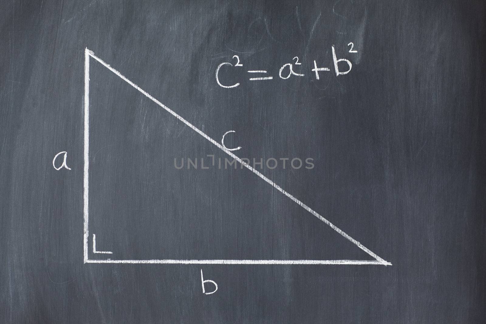 Right triangle with pythagorean formula on a blackboard