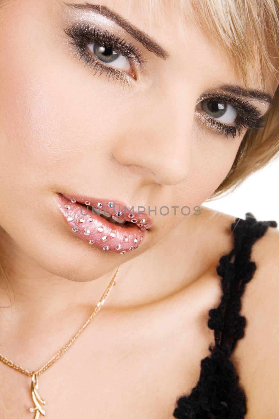 Beautiful young woman with creative makeup face fortrait