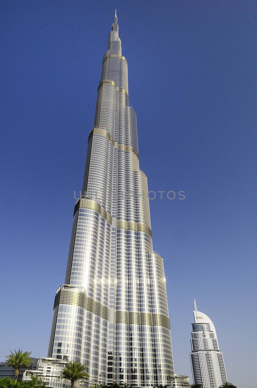DUBAI, UAE - FEBRUARY 22: DUBAI, UAE - FEB 22: The Address Hotel in the downtown Dubai area overlooks the dancing fountains, and Burj Khalifa facade on February 22, 2012 in Dubai, UAE. Burj Khalifa is a tallest building in the world, at 828m. Located on Downtown Dubai, 