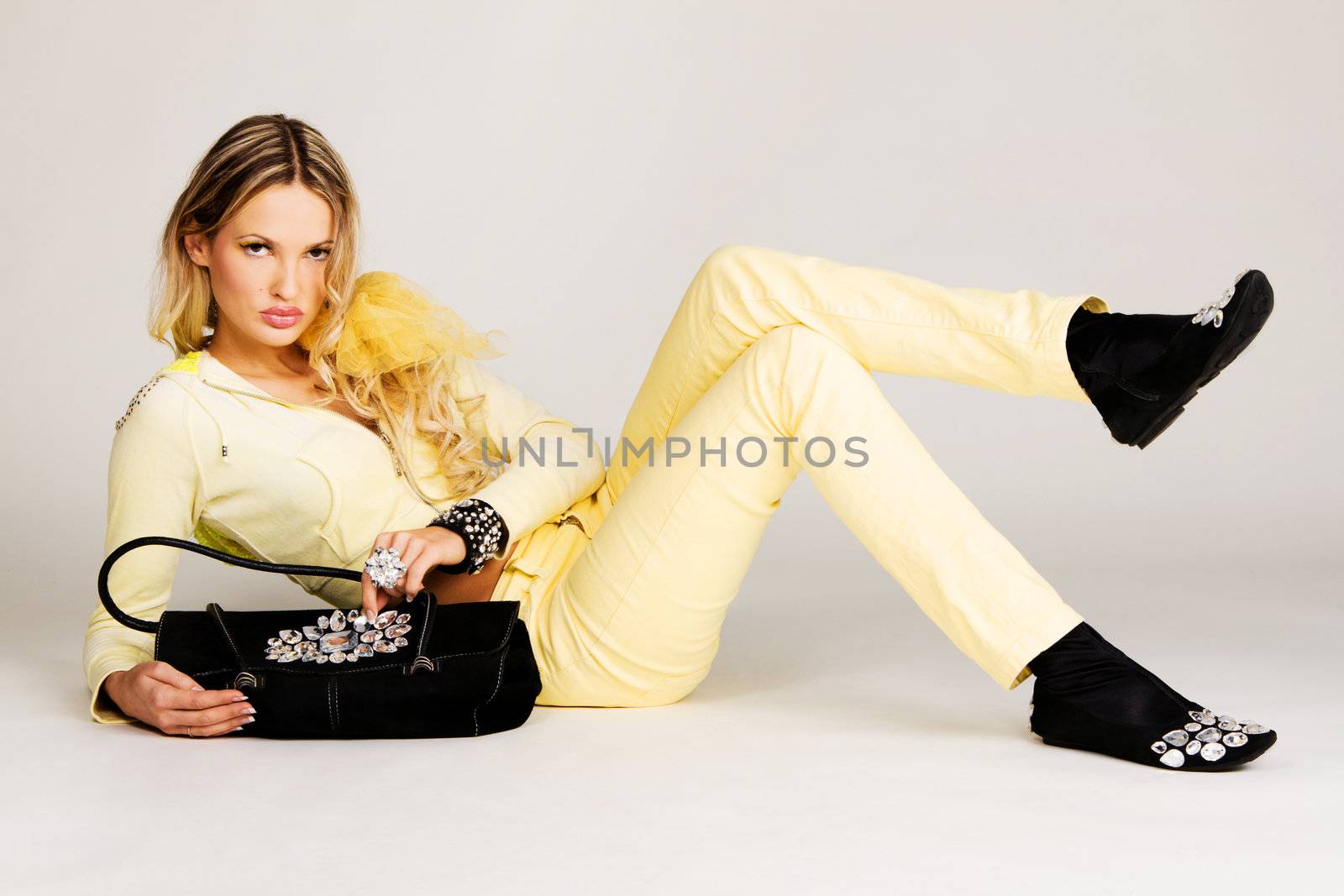 Fashion model in yellow by Gdolgikh