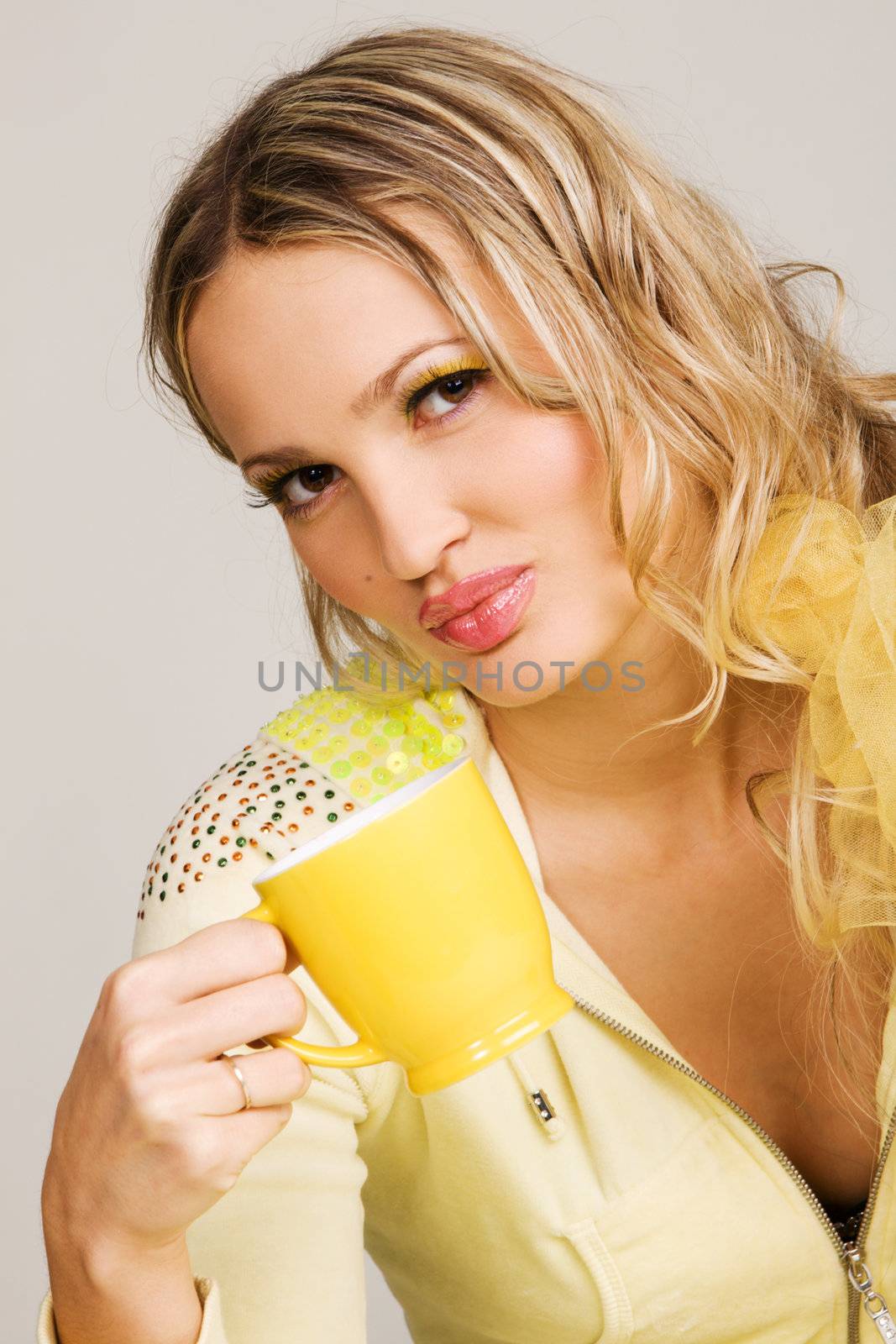 Beautiful woman drinking tea face portrait