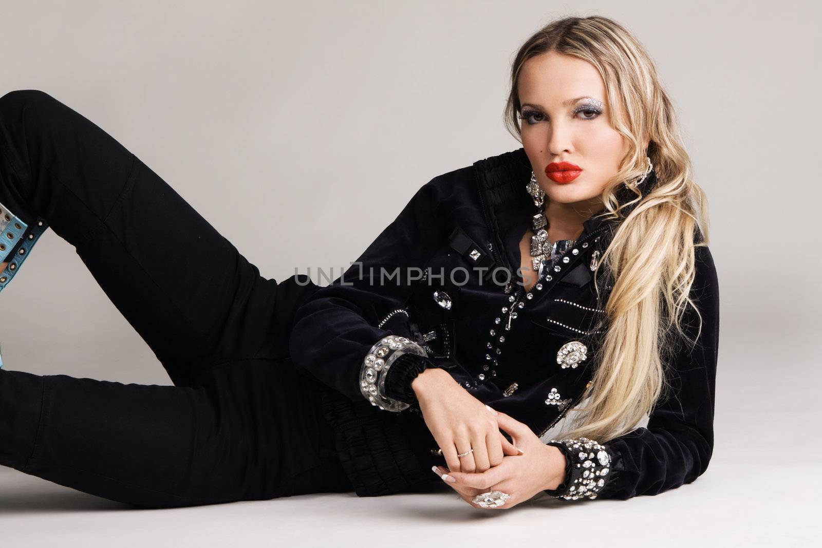 Fashion model in black clothing by Gdolgikh