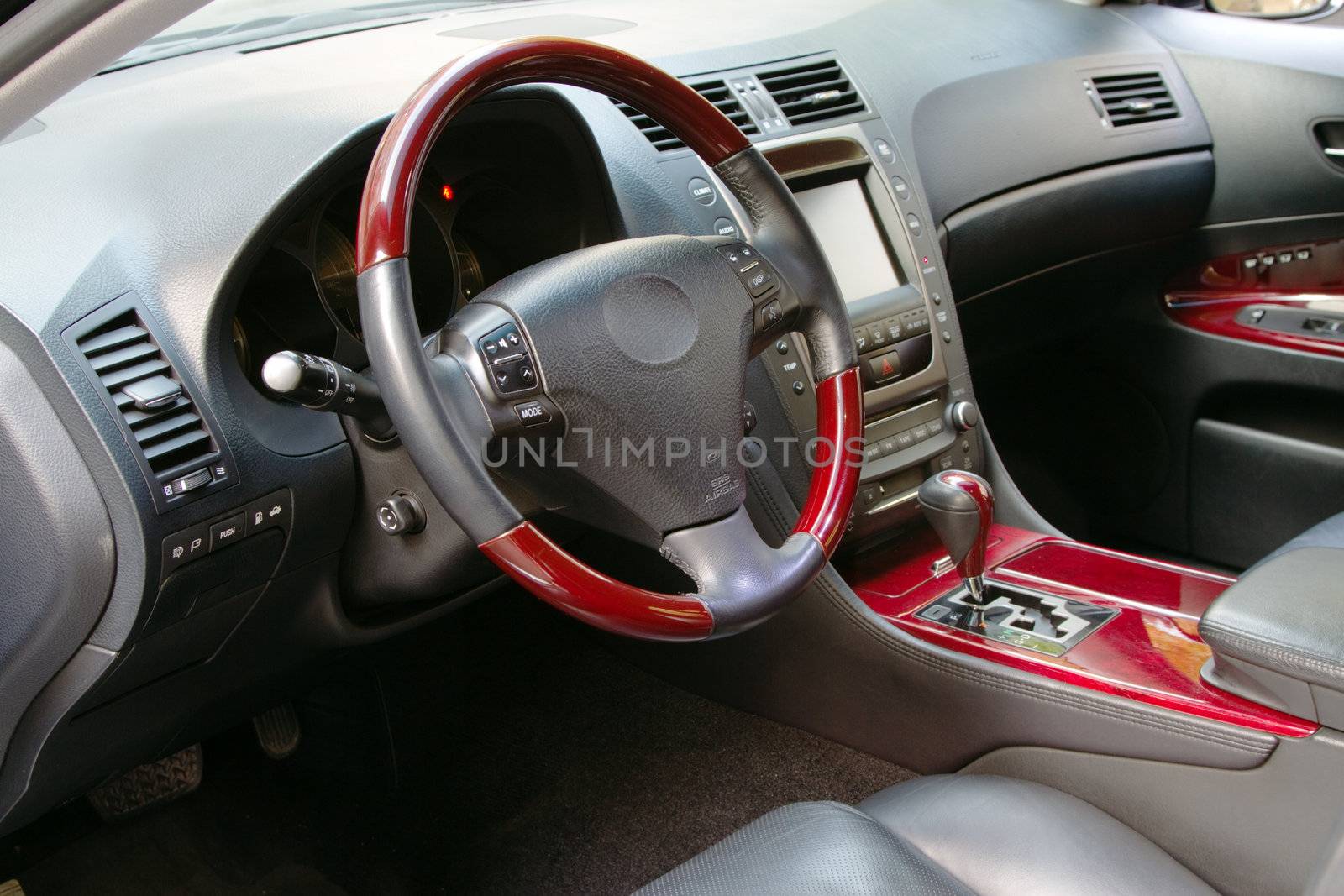 Interior of a luxury car with mahogany finish