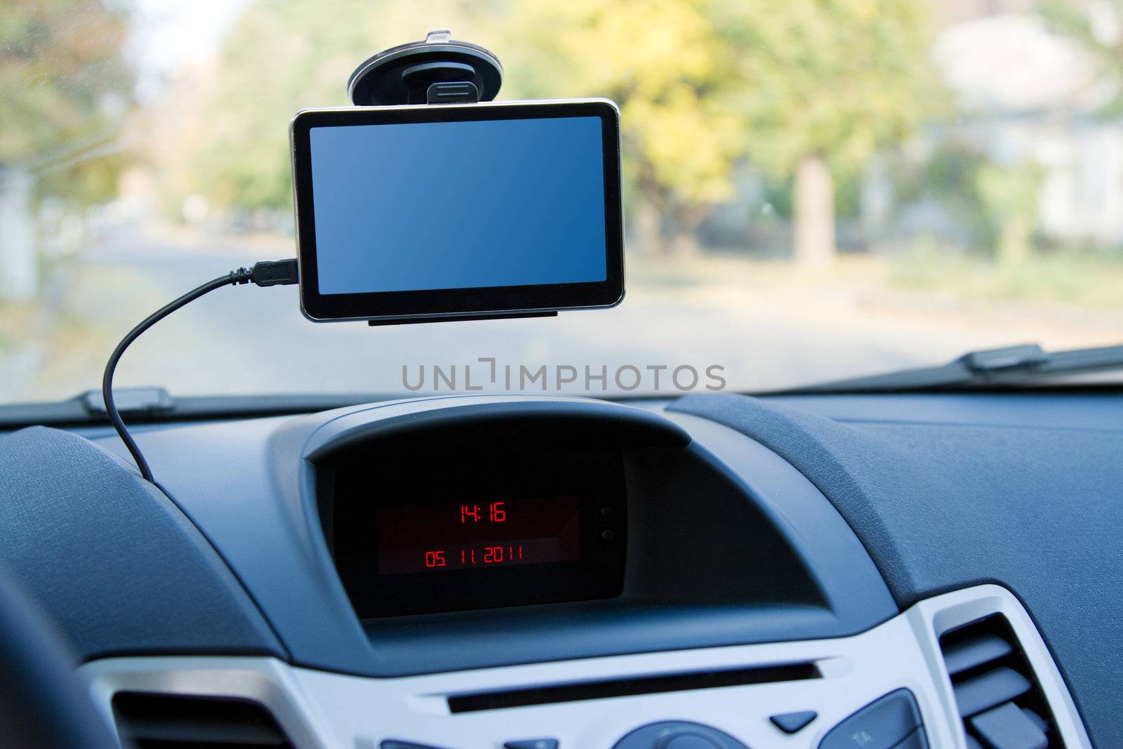 Car gps navigator atteched to the windshield