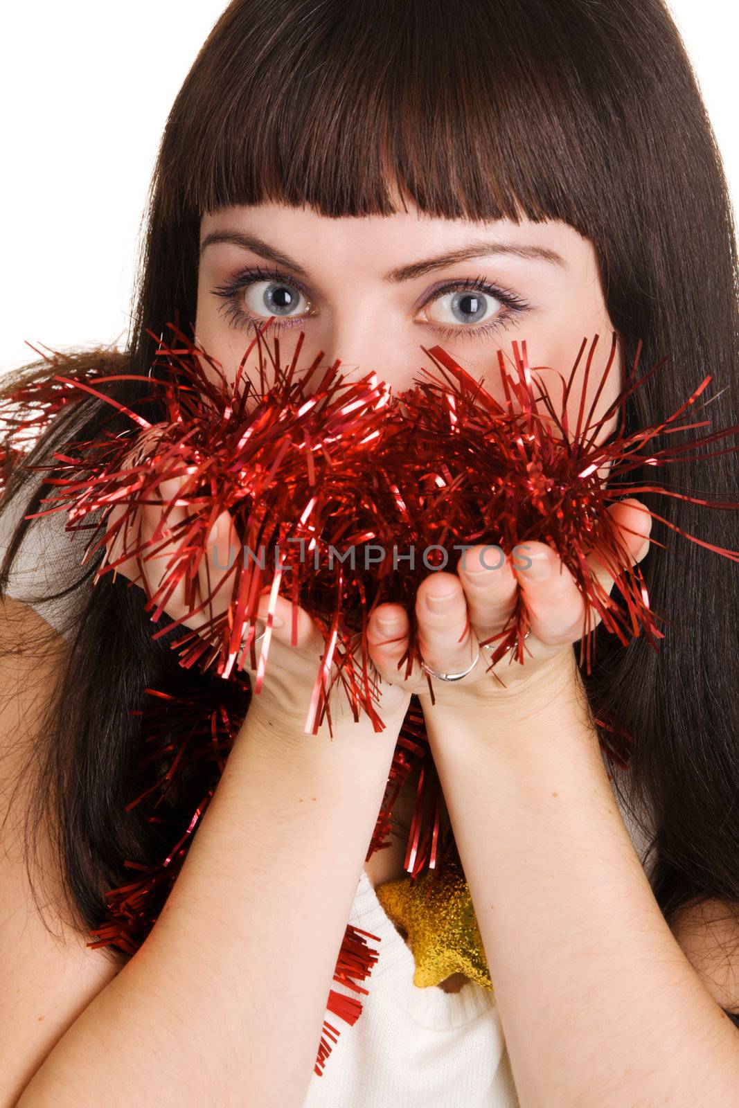 Young beautiful lady holding Christmas decorations