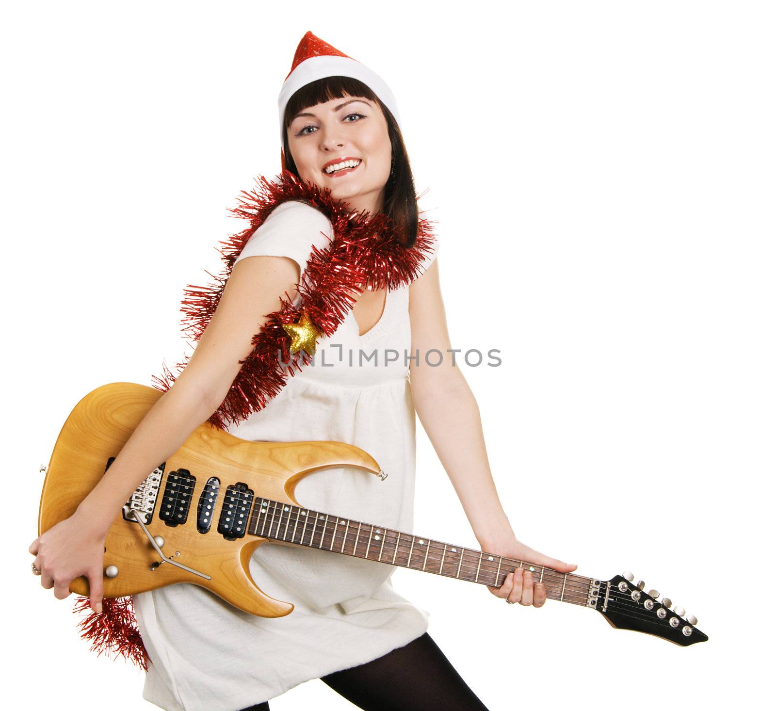 Cheerful Christmas girl with an electric guitar