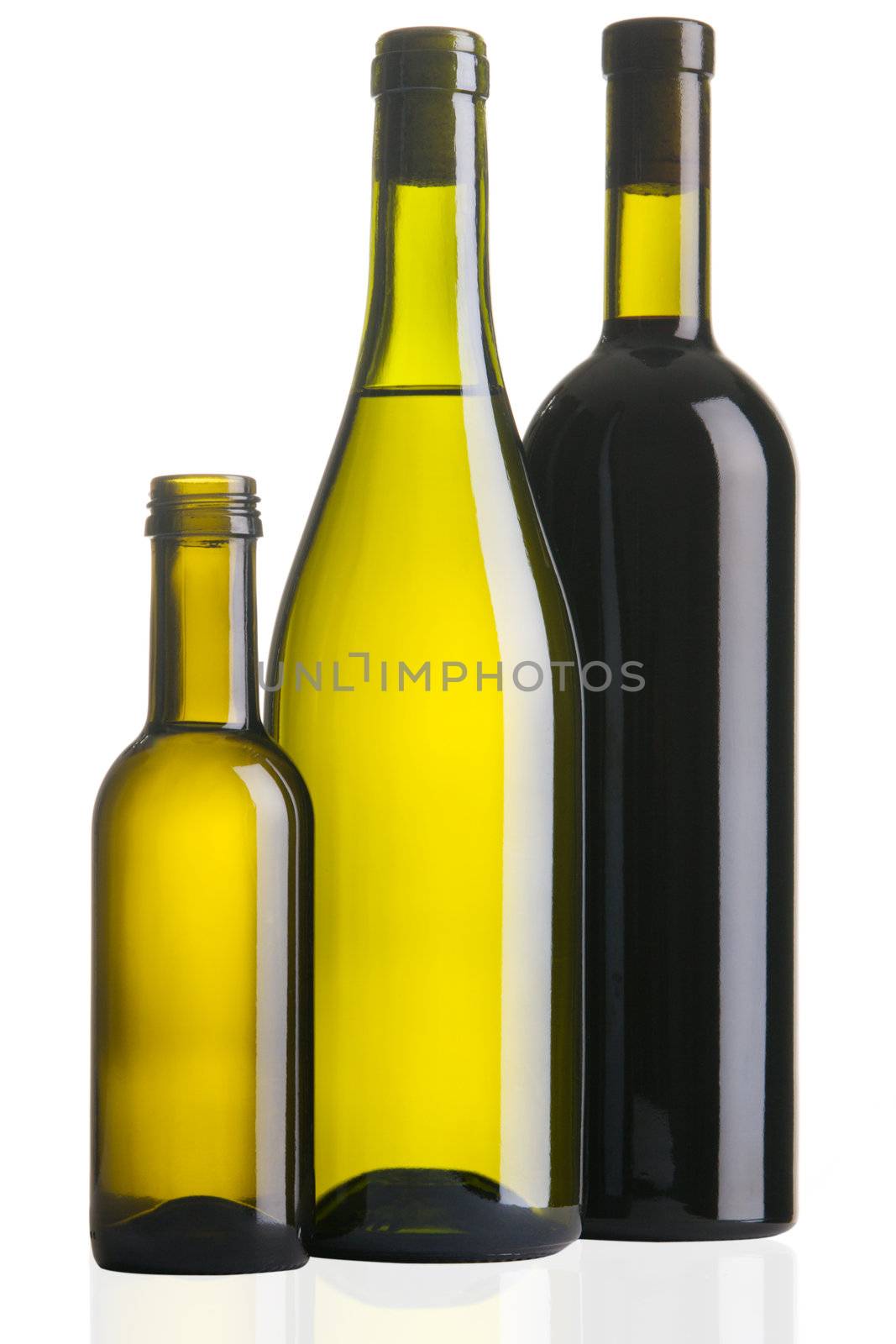 Three wine bottles isolated on white background