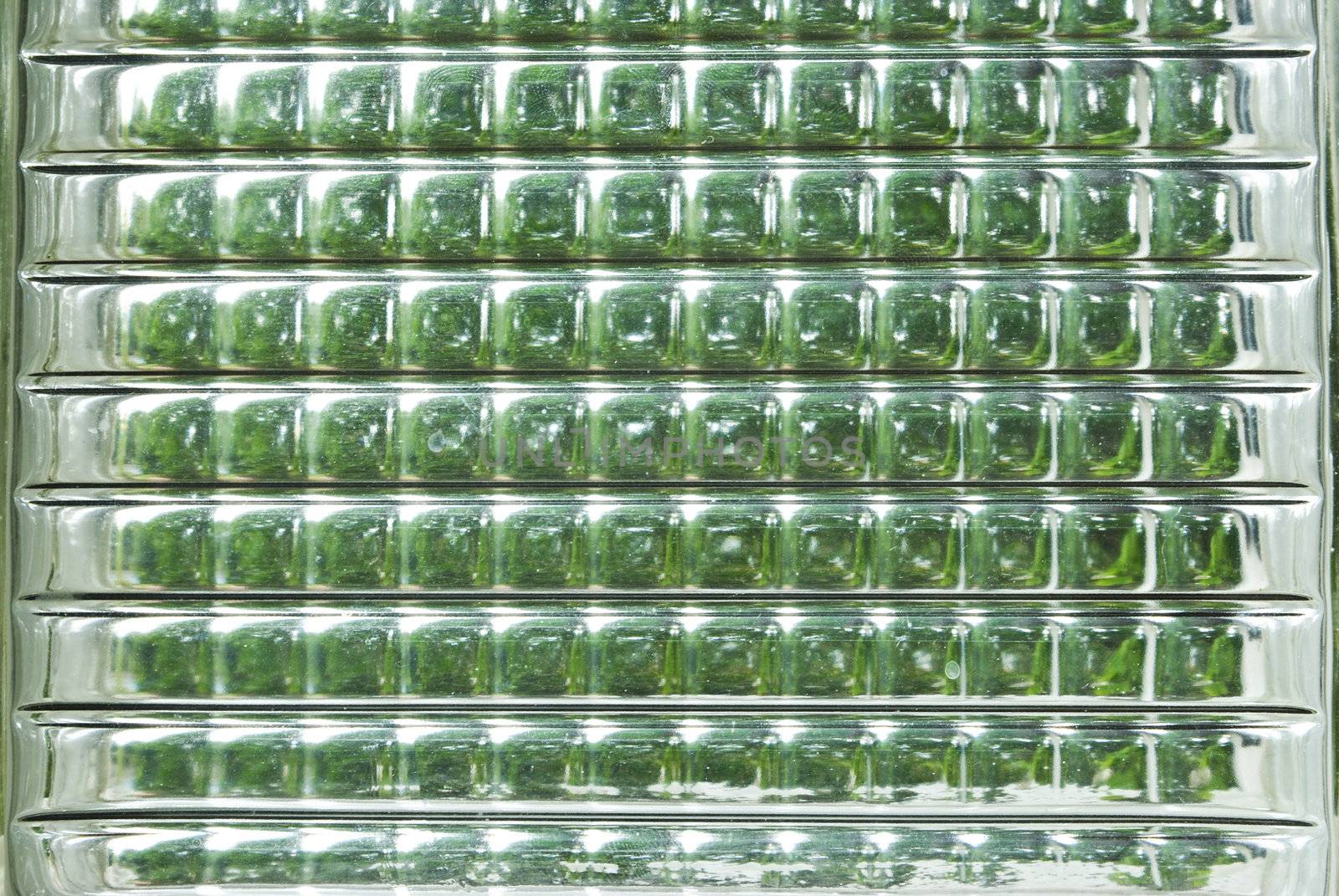 Sunlight through the glass.