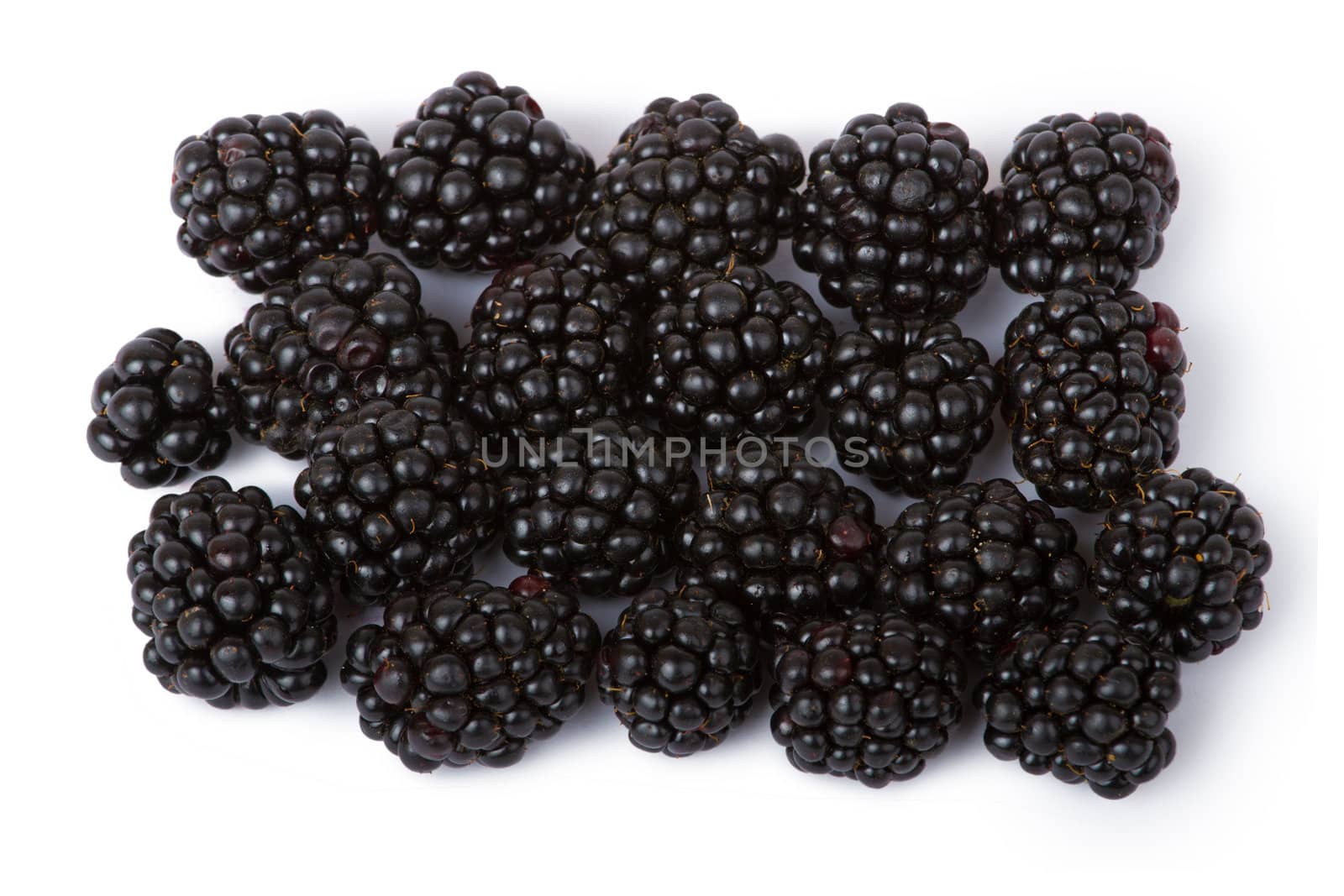 Ripe juicy blackberries isolated on white background