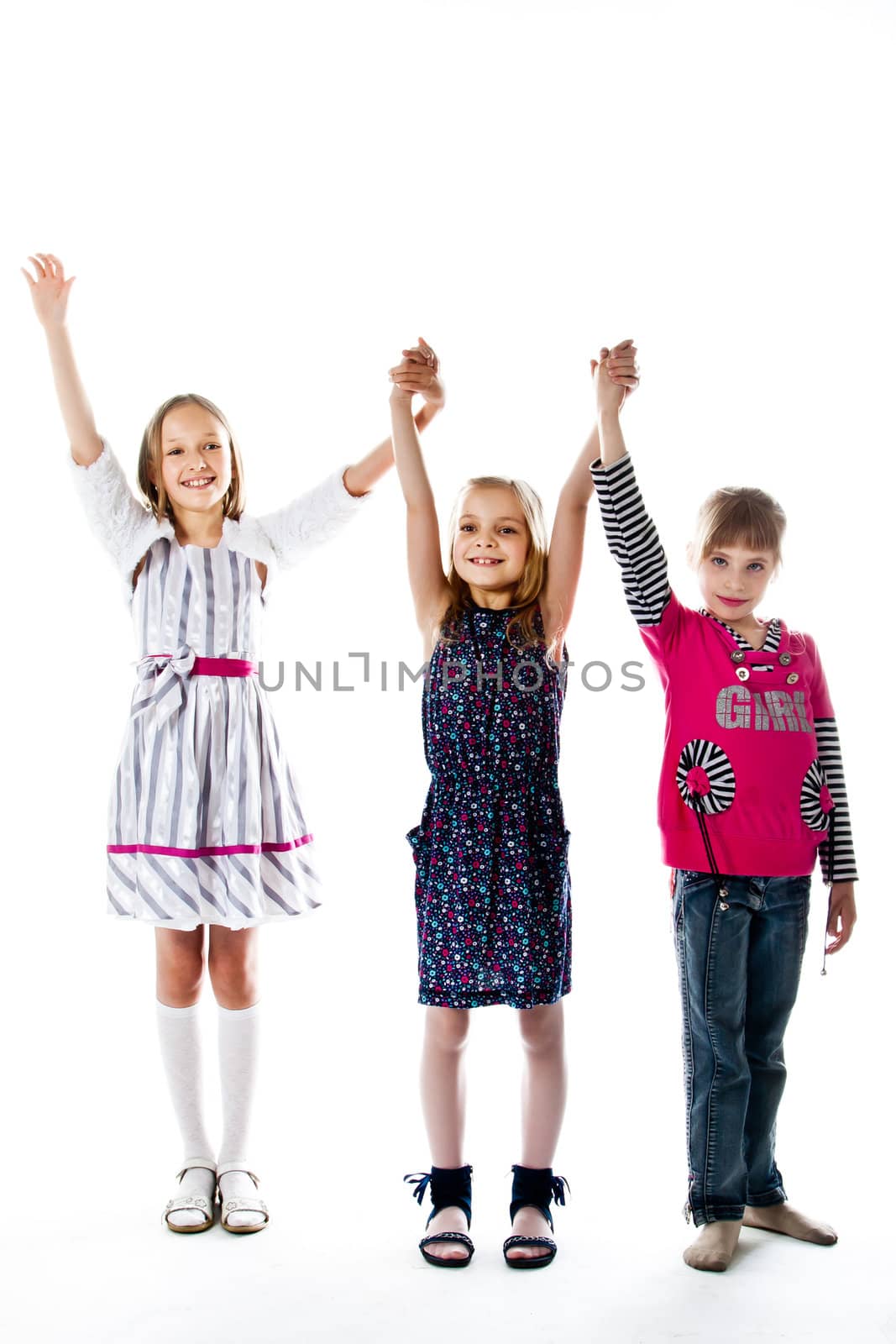 Three little cute girl isolated on white background