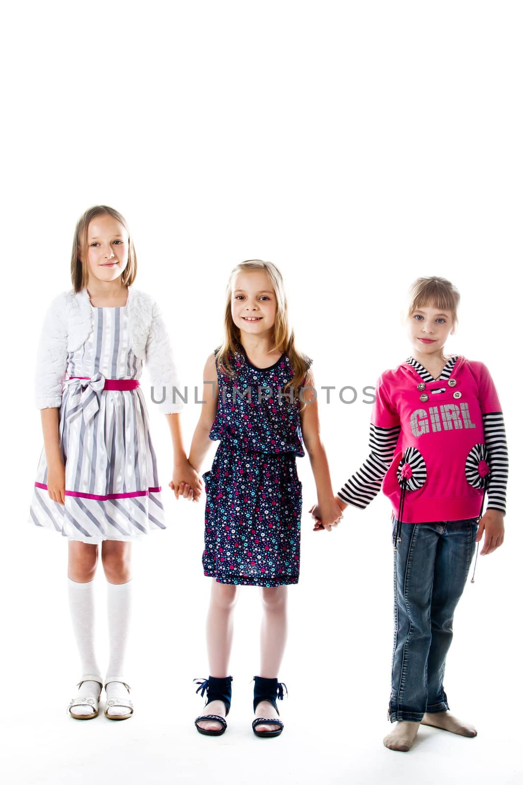 Three little cute girl isolated on white background