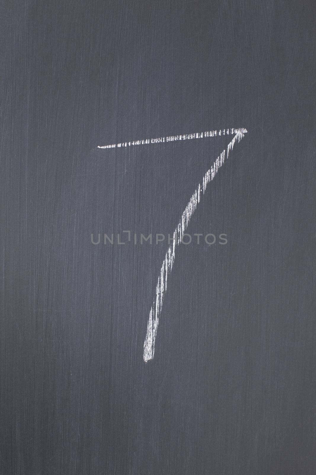 Blackboard with "7" written on it