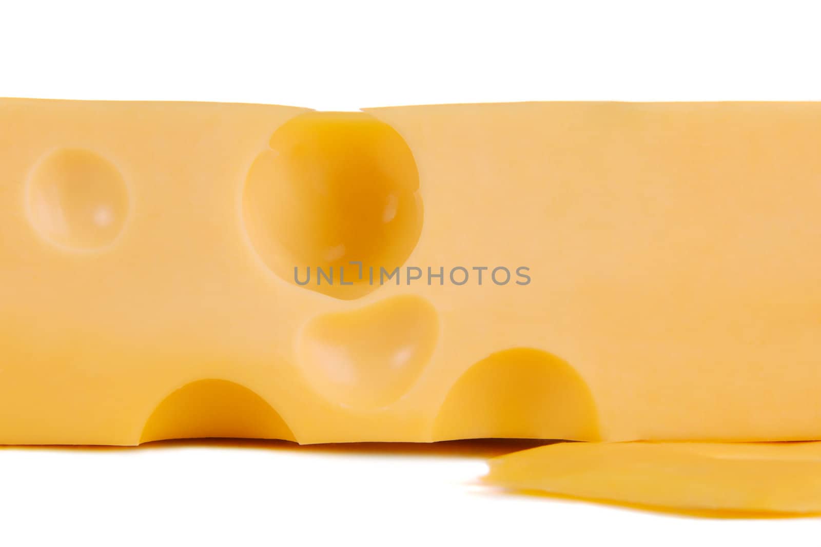 Slice of cheese isolated on white by Gdolgikh