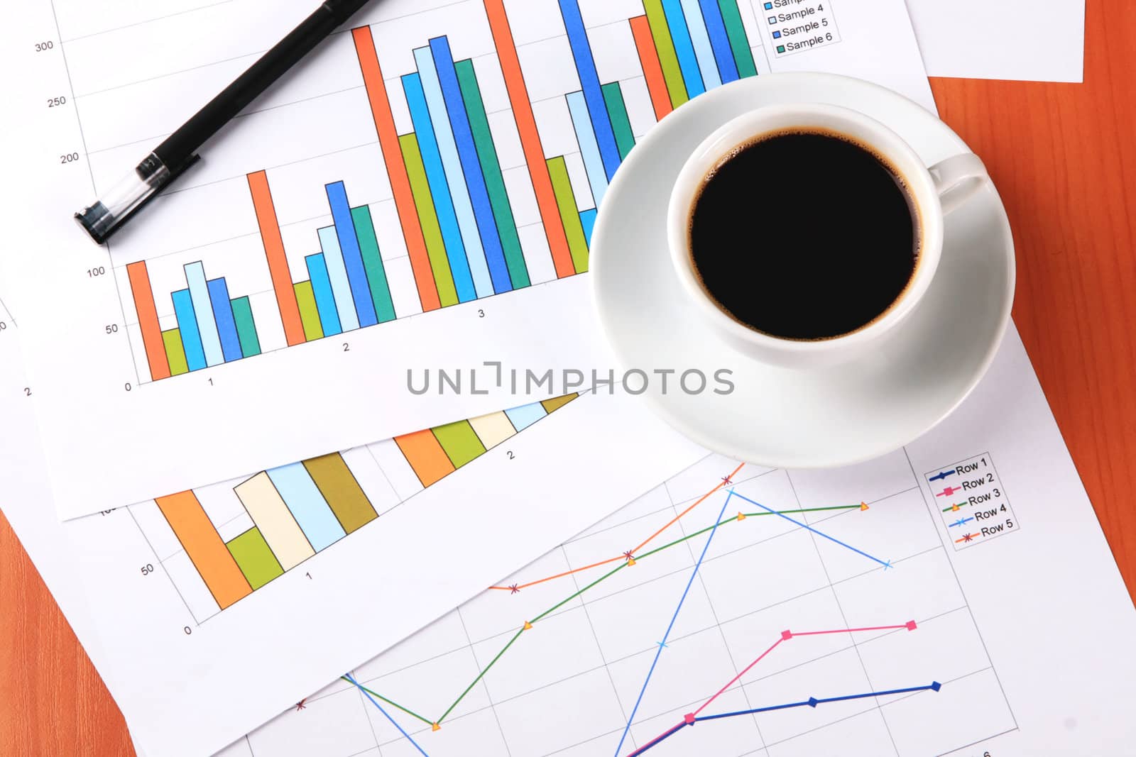 Businessman's workplace with documents and cup of coffee