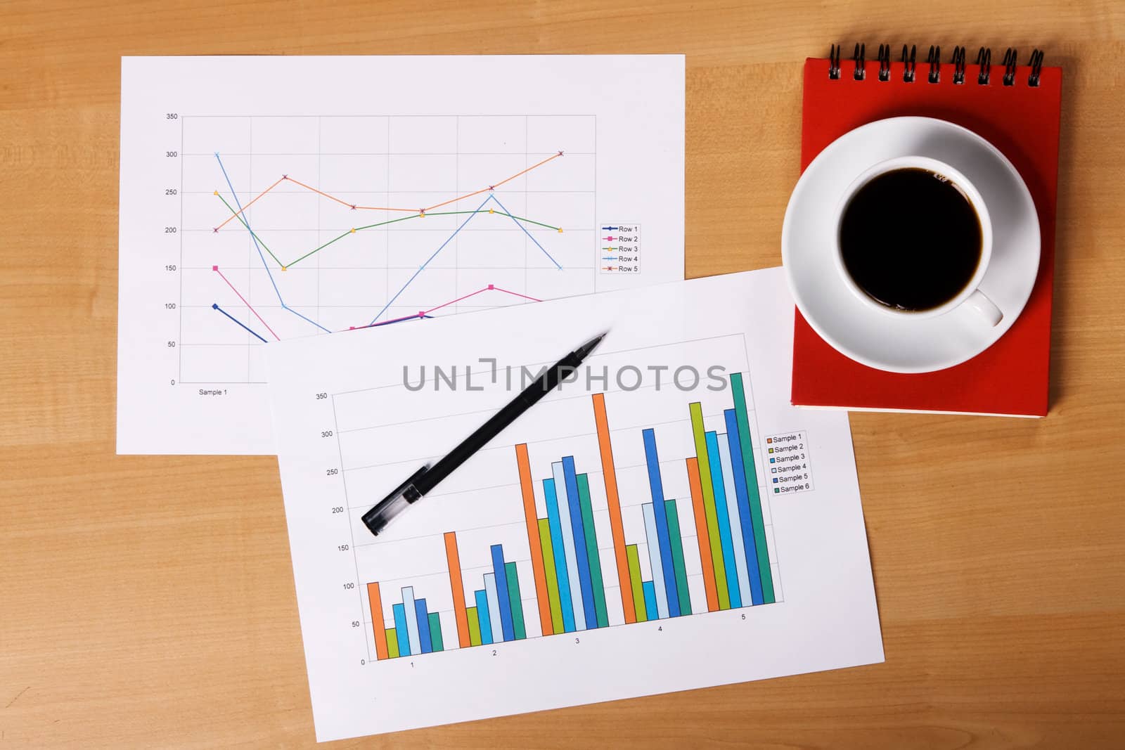 Worktable covered with documents, view from above