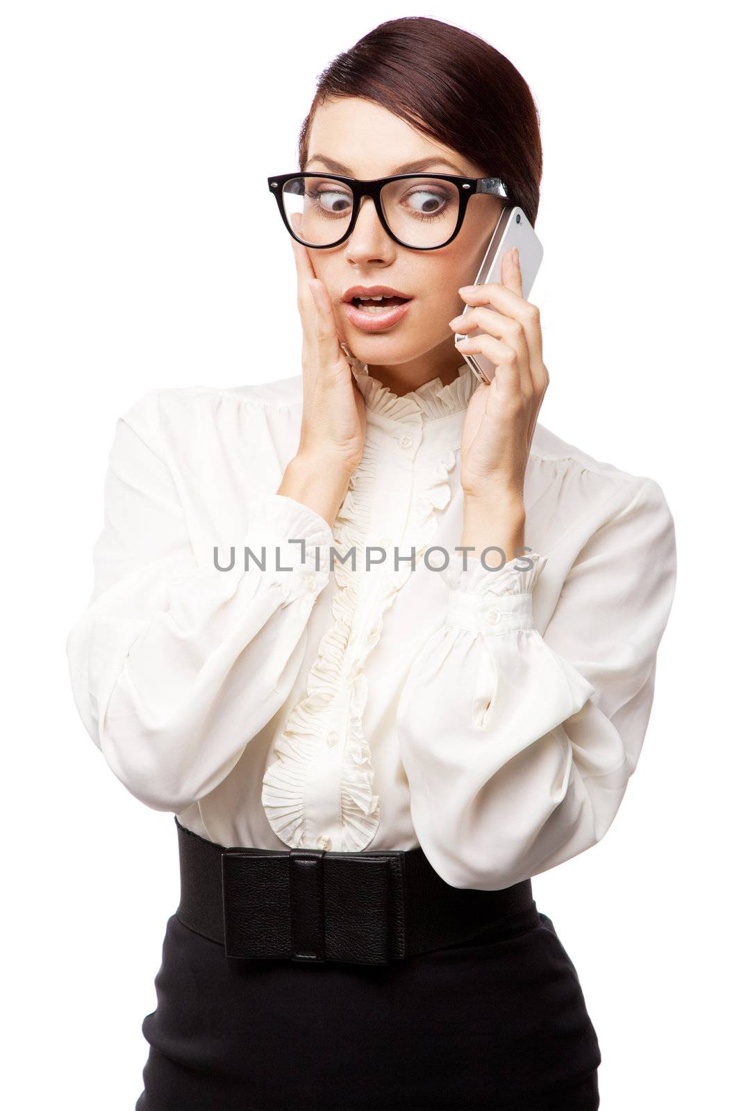 Strict woman in large glasses with a cell phone, isolated on white background