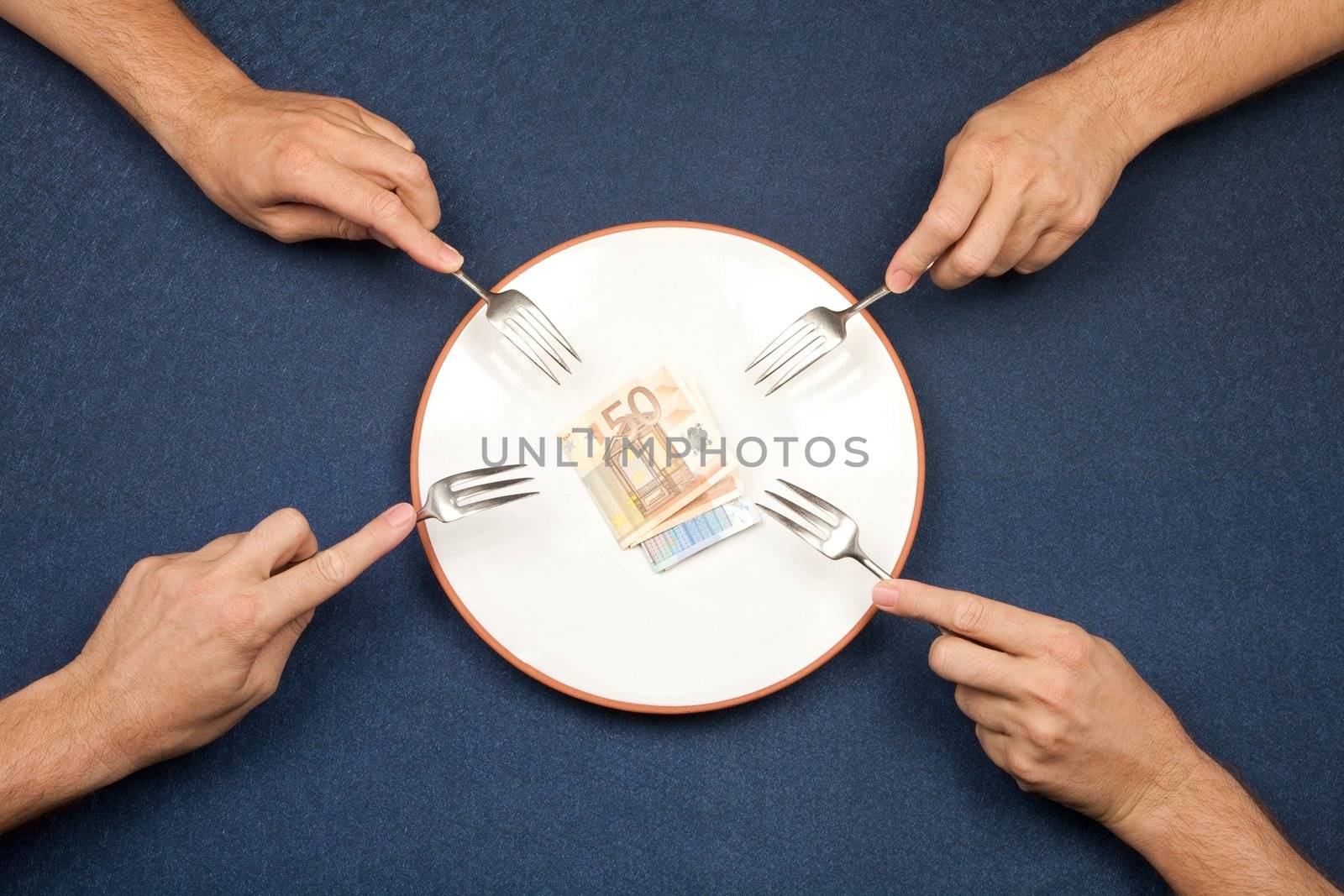 hand of man and wad of euros on white plate