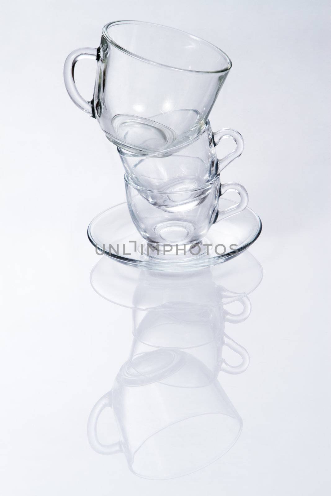 Glass cups studio photo by Gdolgikh