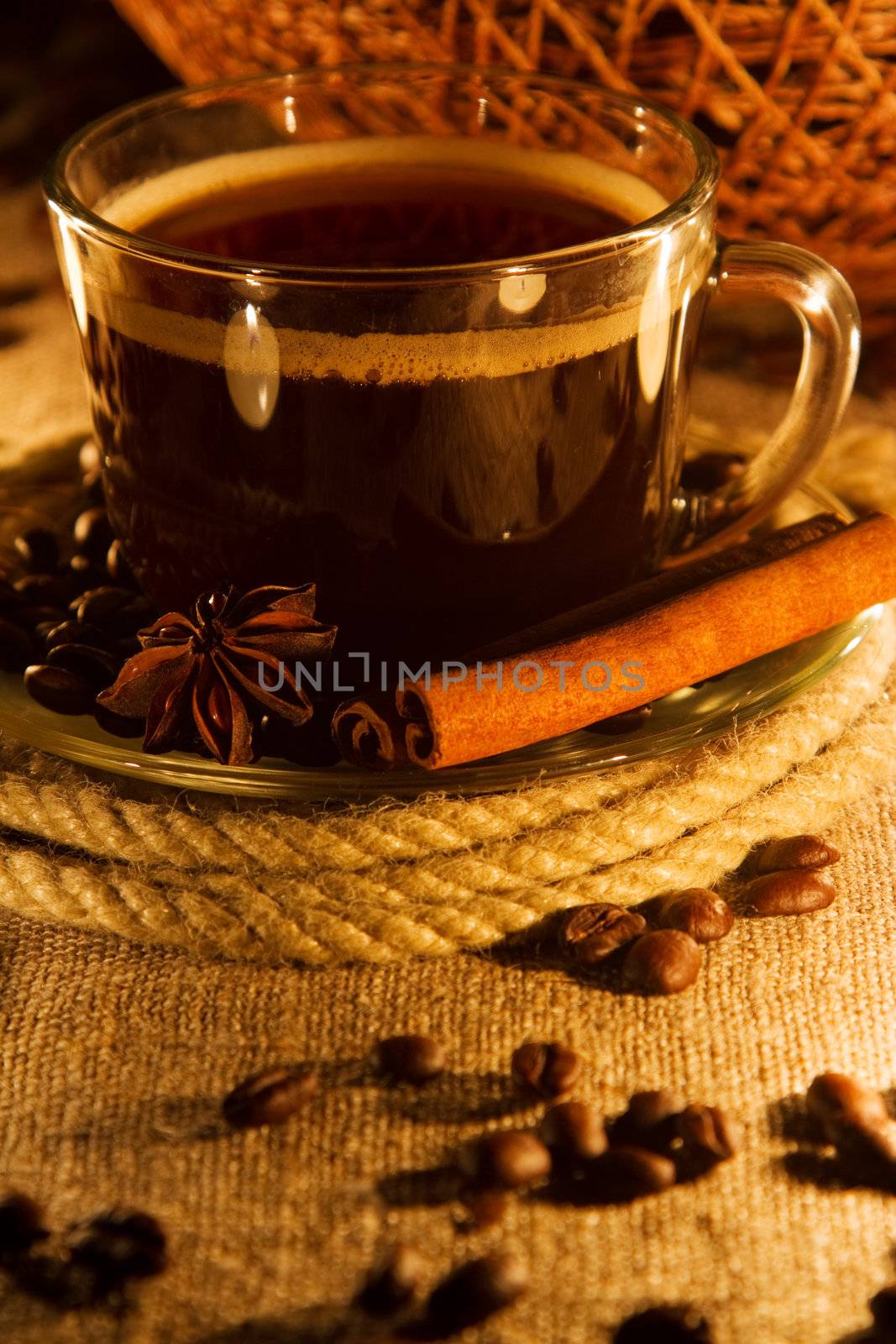 Cup of coffee in natural candle lighting