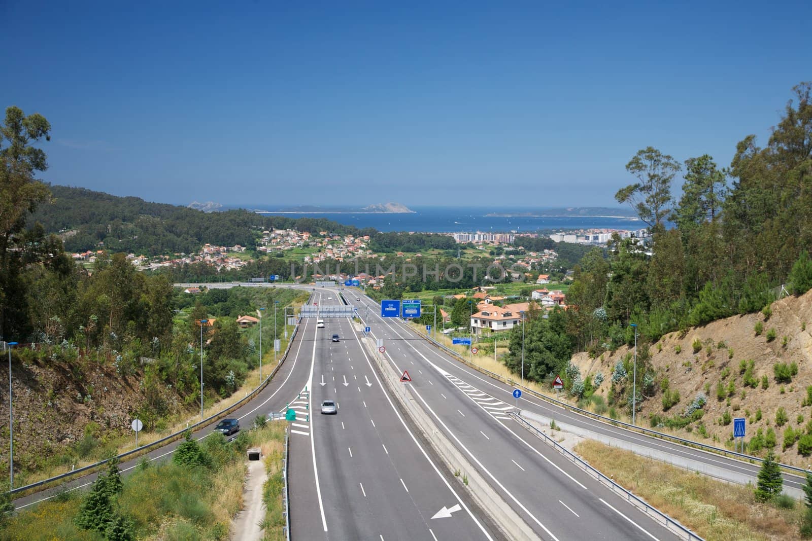 three lanes highway next Vigo city in Galicia Spain