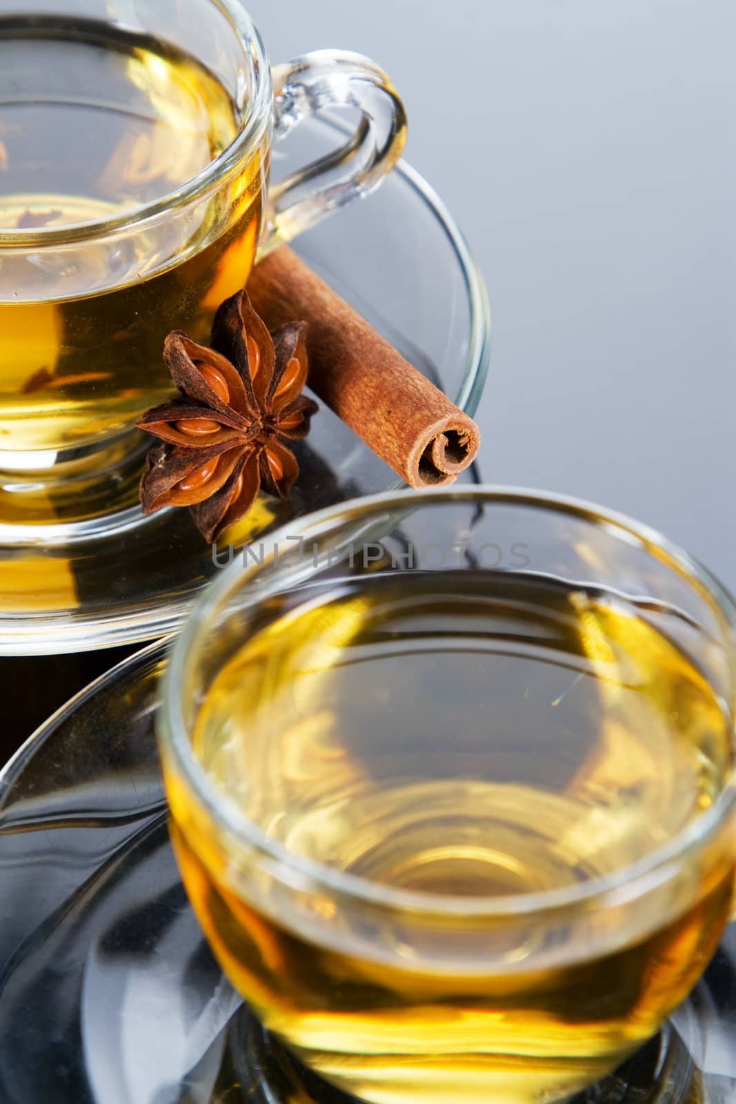 Tea cup with fresh mint leaves, closeup photo