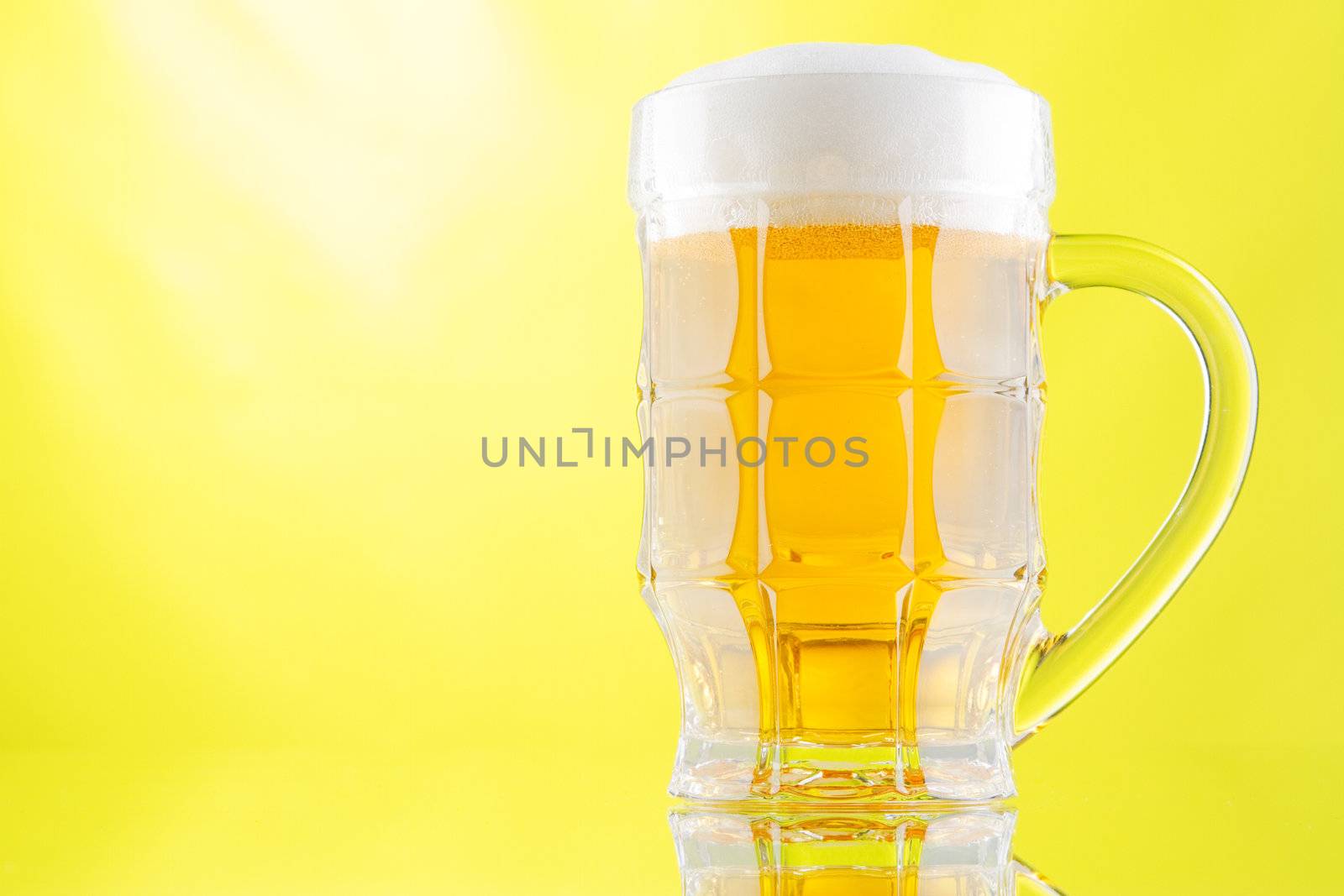 Beer mug and bottle isolated on white background, studio photo