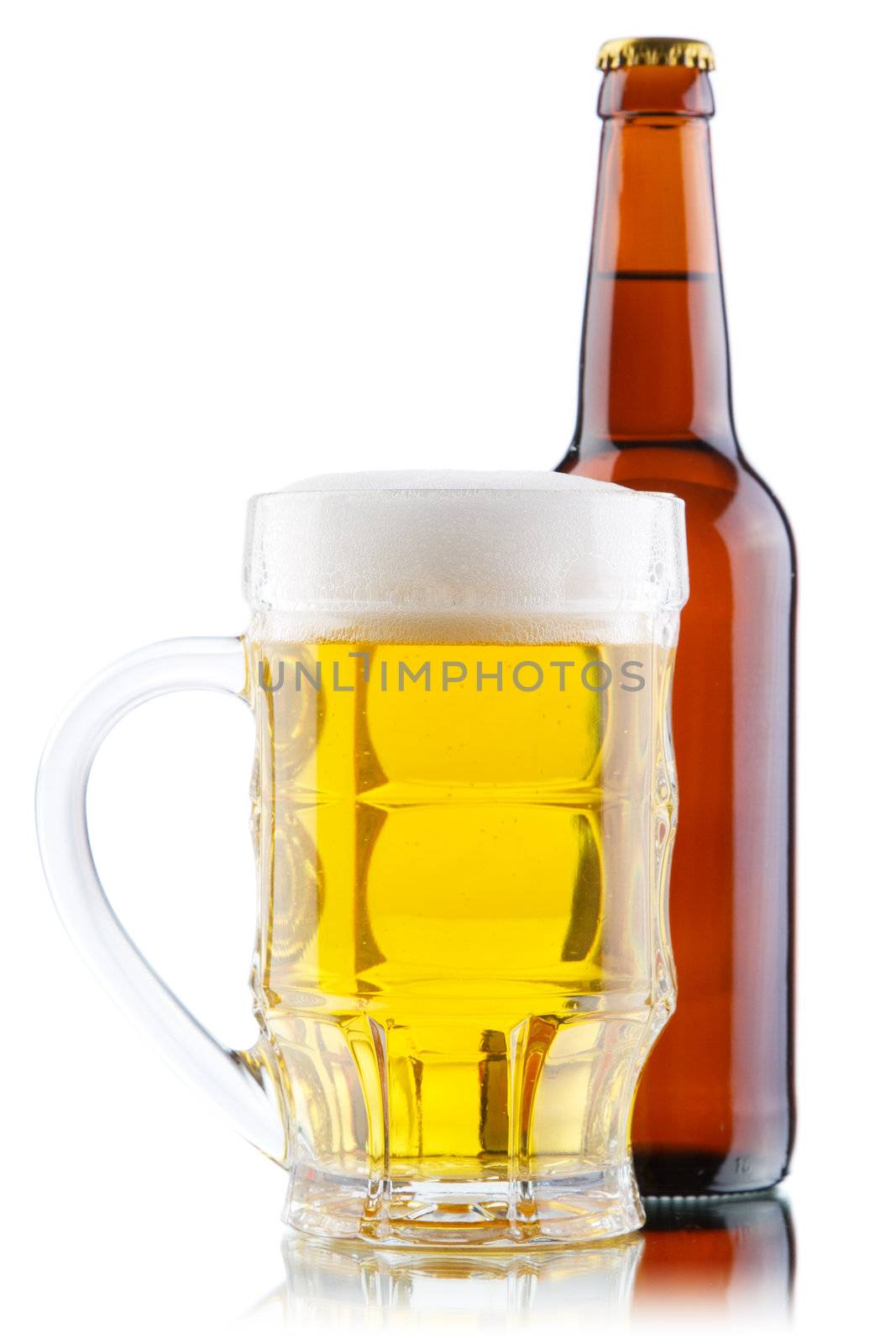 Beer mug and bottle isolated on white background, studio photo