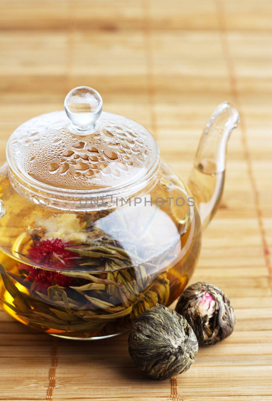 Closeup of glass teapot with fresh tea 