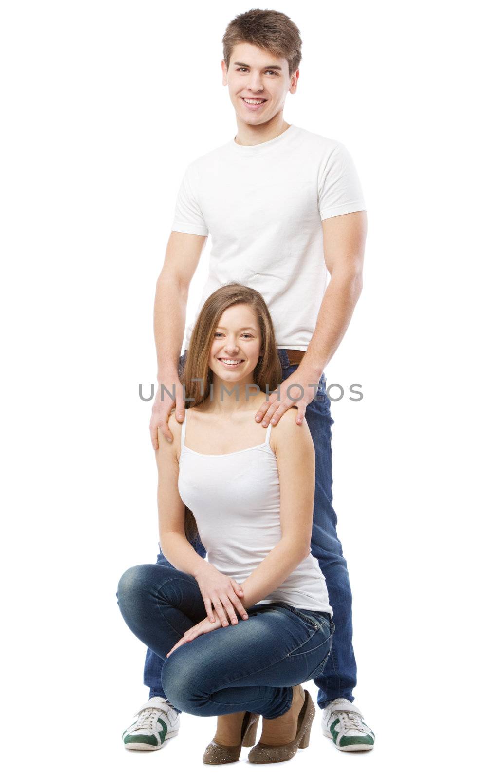 Young beautiful couple isolated on white background