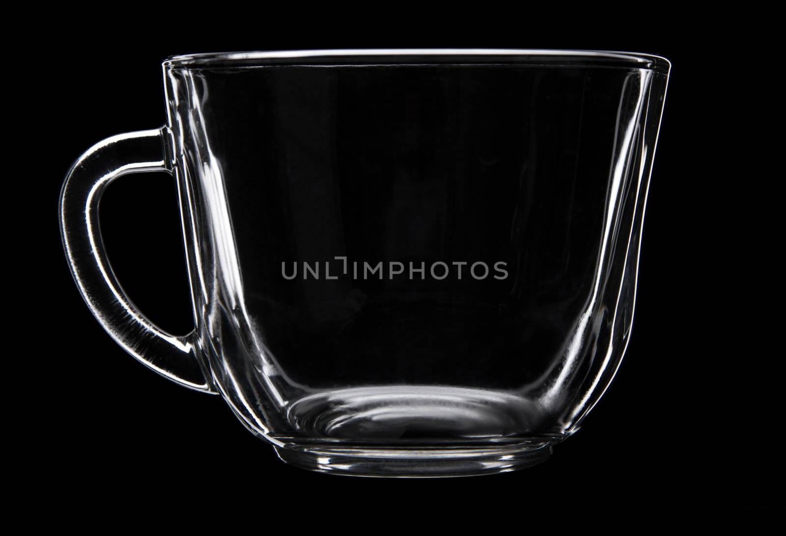 Glass cup on black by Gdolgikh