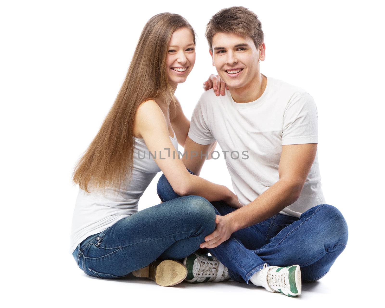Young couple isolated on white background by Gdolgikh