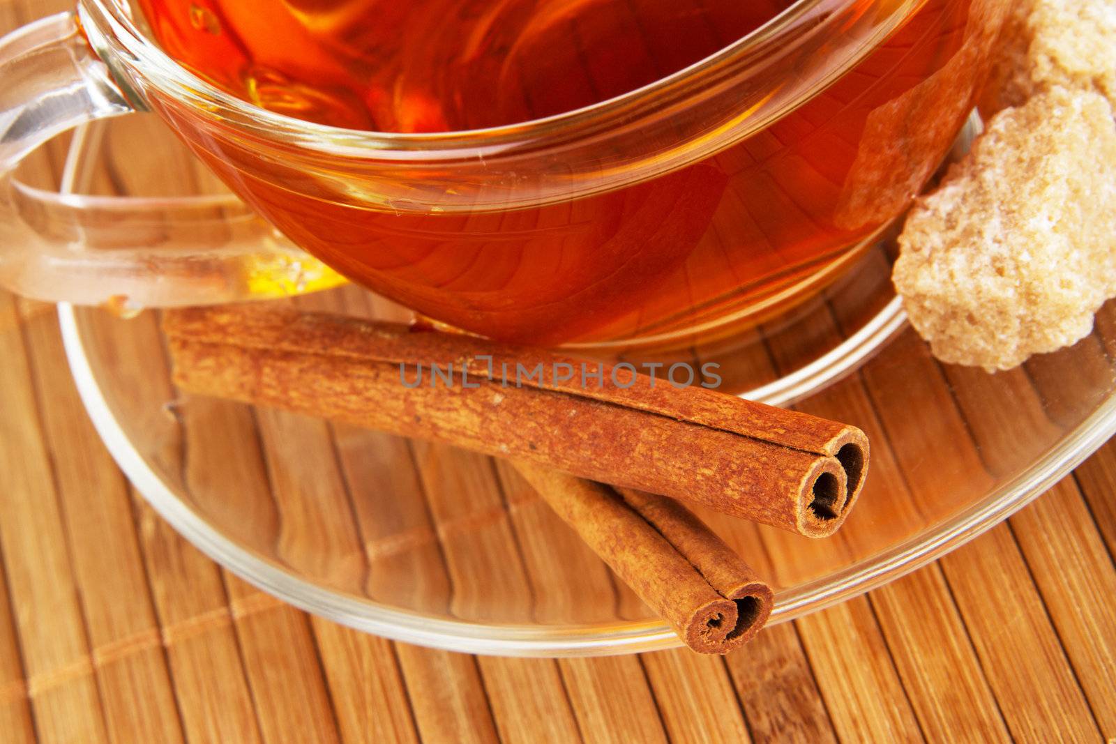 Tea with cinnamon and sugar by Gdolgikh