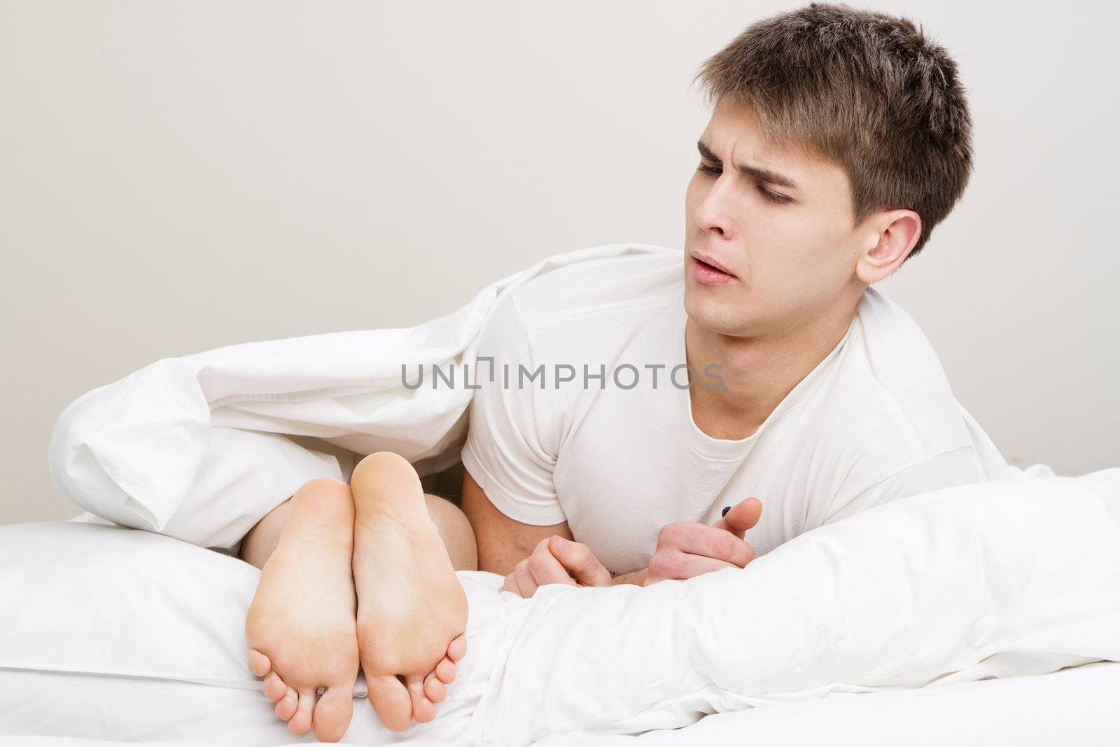 Young couple in bed