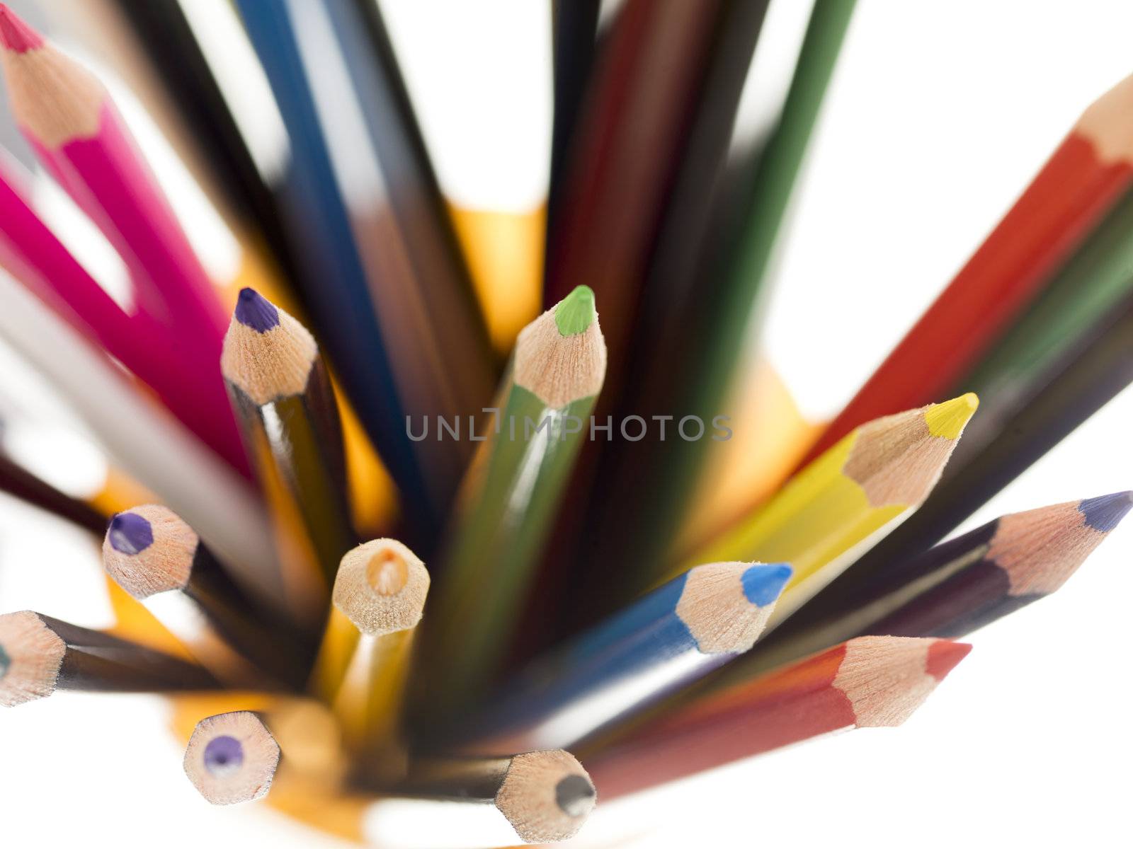 Image of stacked of colorful pencil isolated on a white background