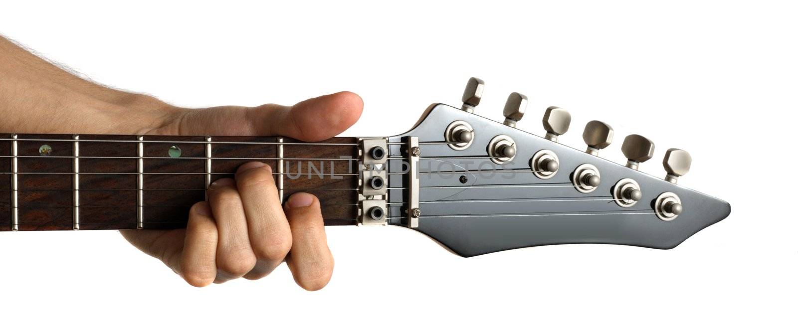 Hand fingering 'Am' chord on electric guitar, isolated on white background