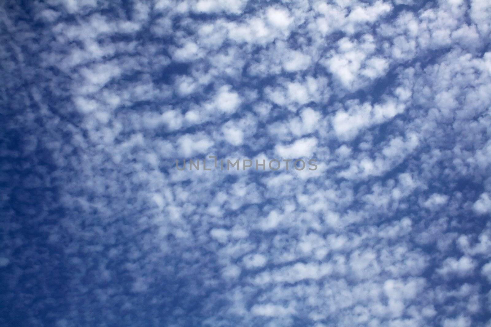 Clouds scattered over a blue sky