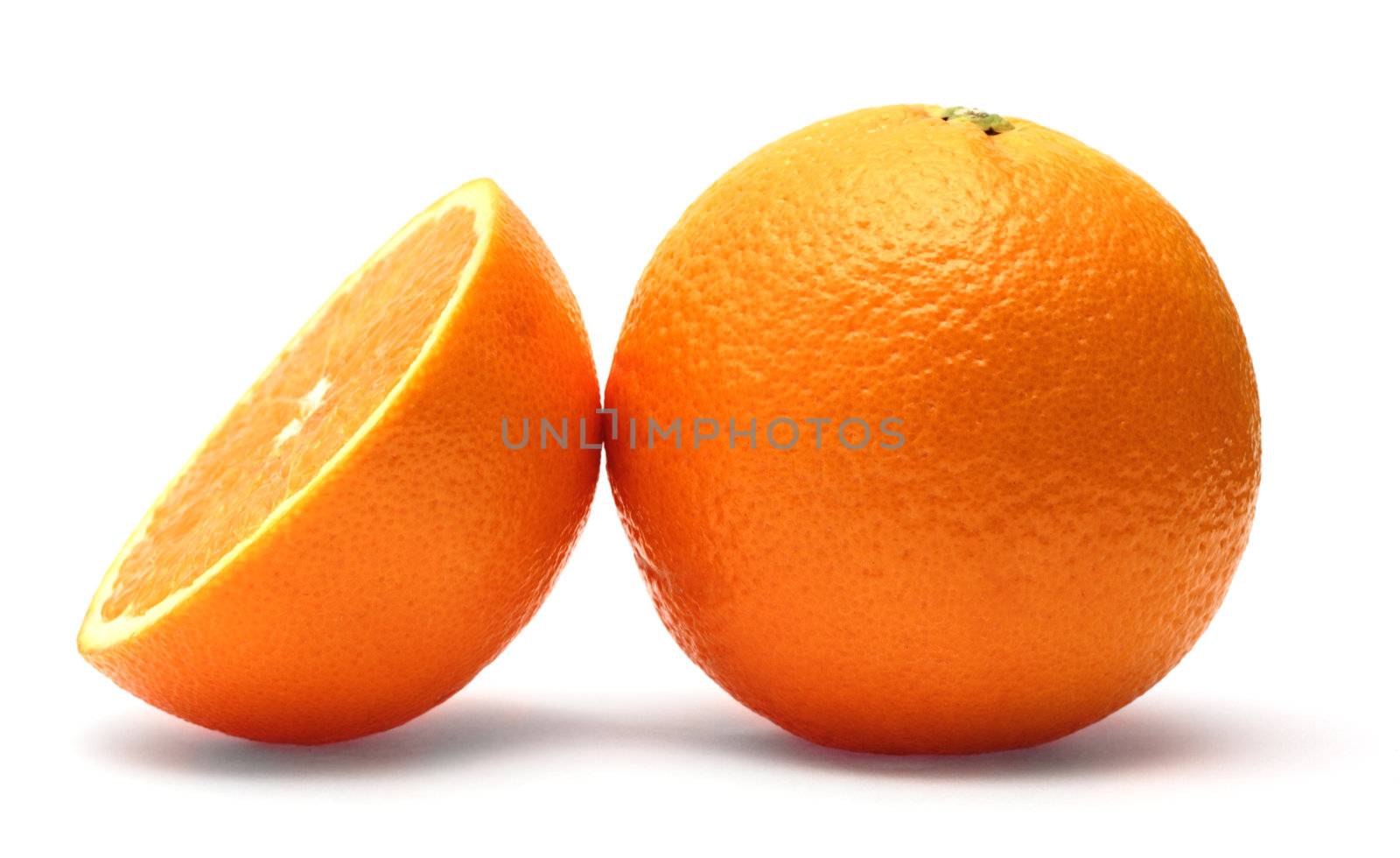 Fresh orange isolated on white by Gdolgikh