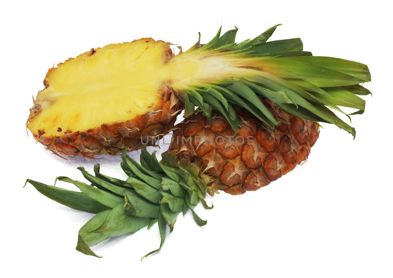 Cut pineapple isolted on white background
