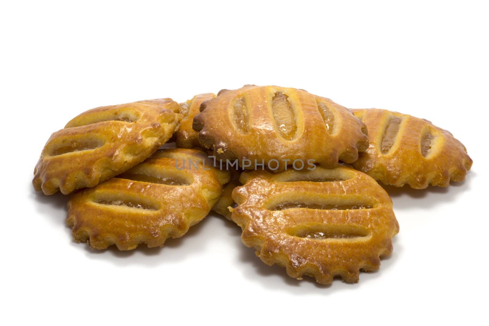 apple and apricots cakes isolated on white
