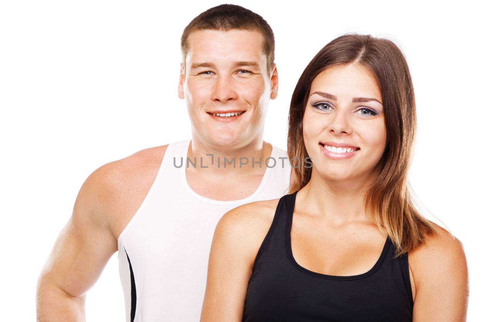 Beautiful healthy-looking couple in sports outfit by Gdolgikh