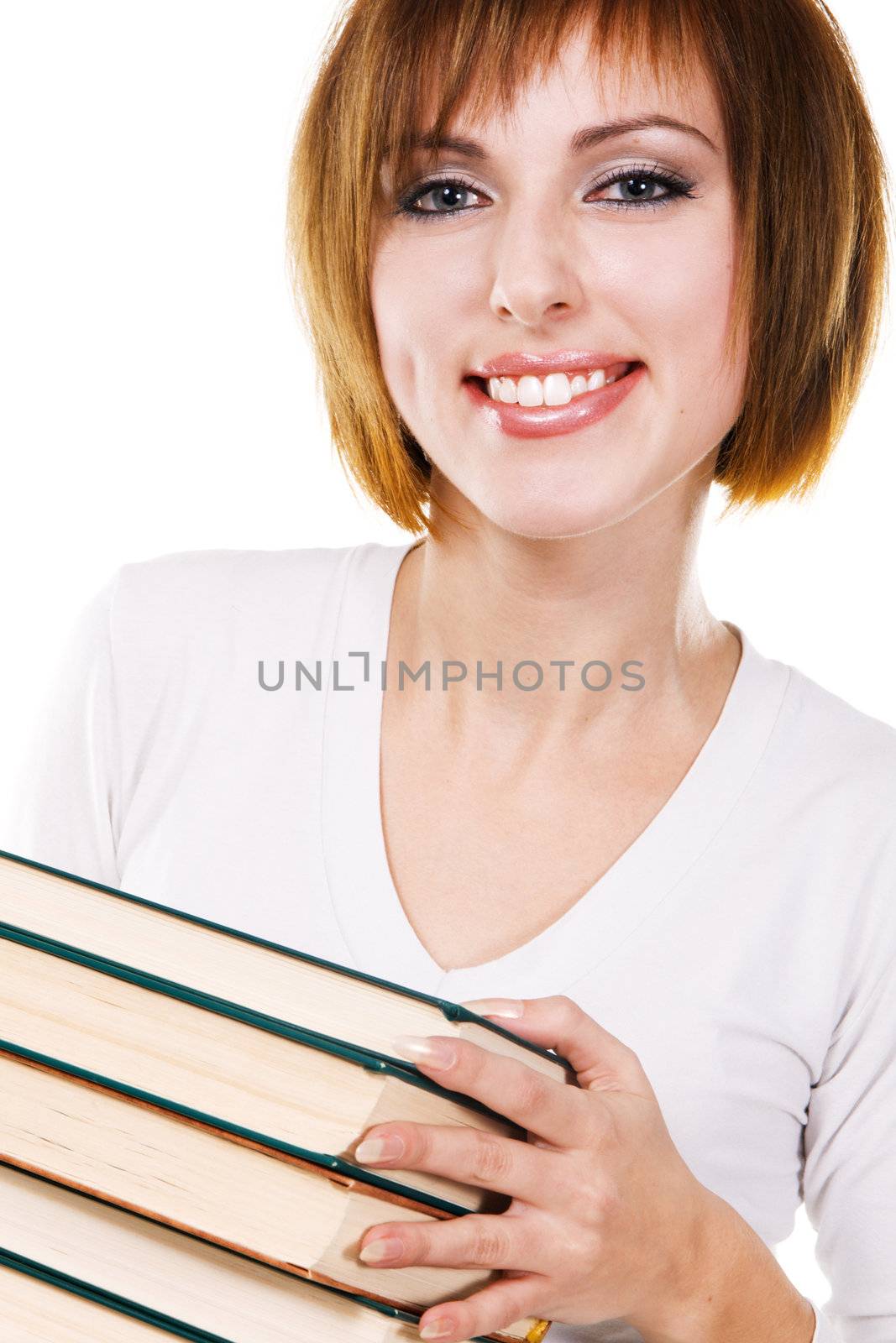 Lovely girl with a stack of books, white background 