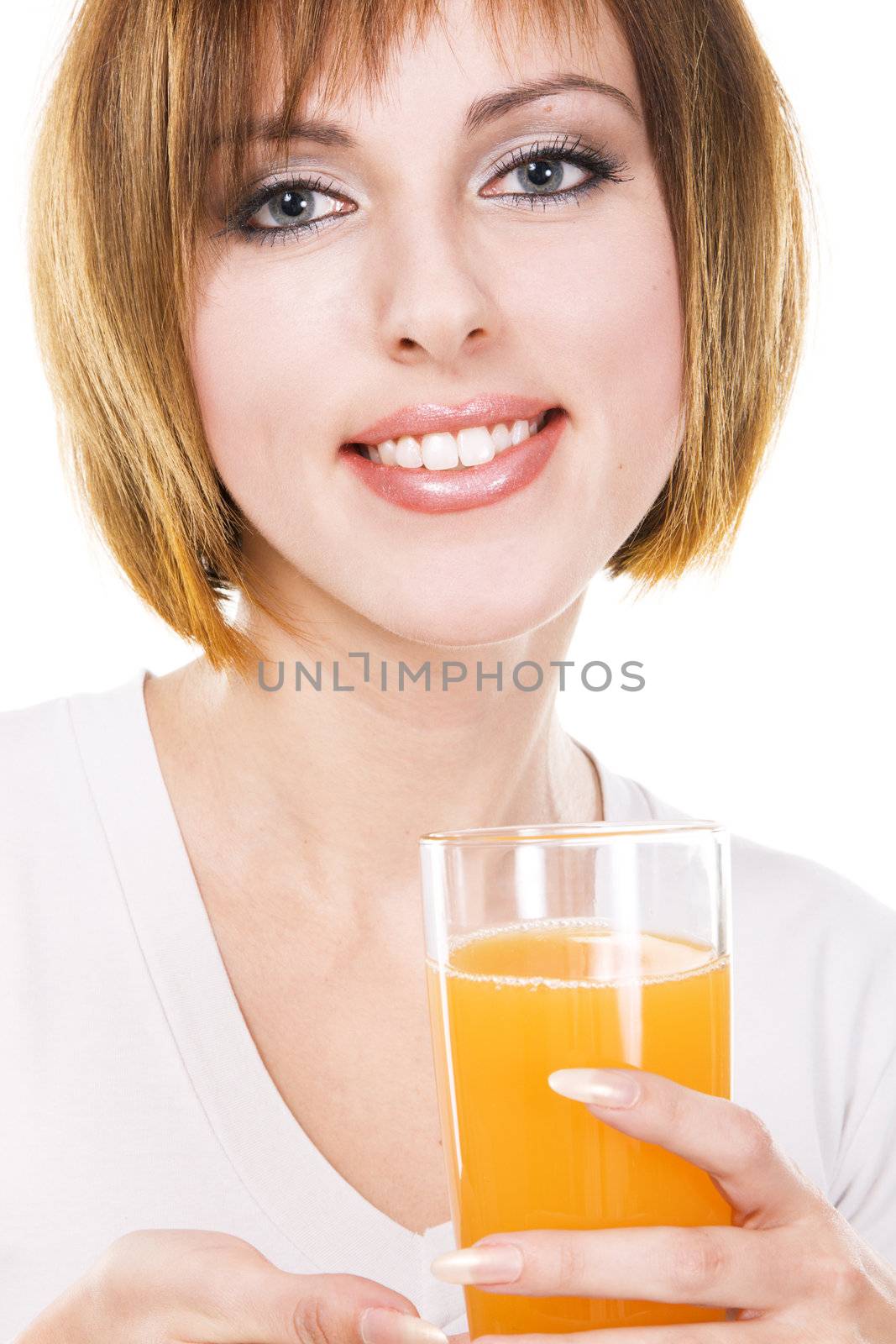 Lovely young woman with a glass of fresh orange juice 