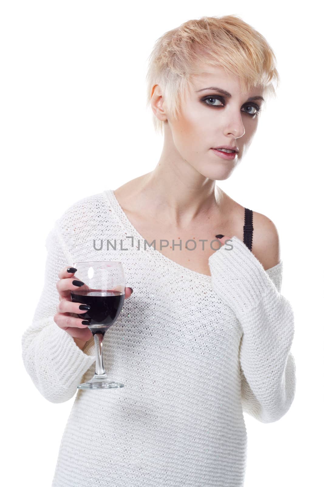 Portrait of a beautiful woman with glass of wine against white background
