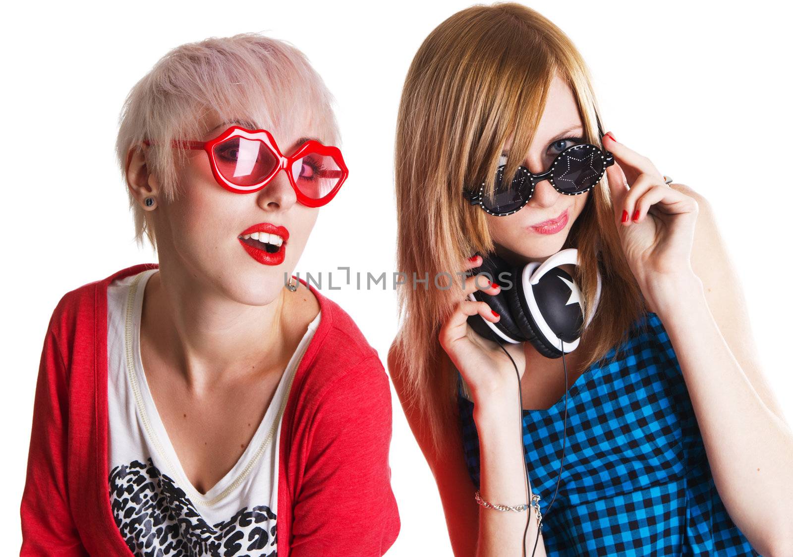 Lovely teenage girls having fun together, white background