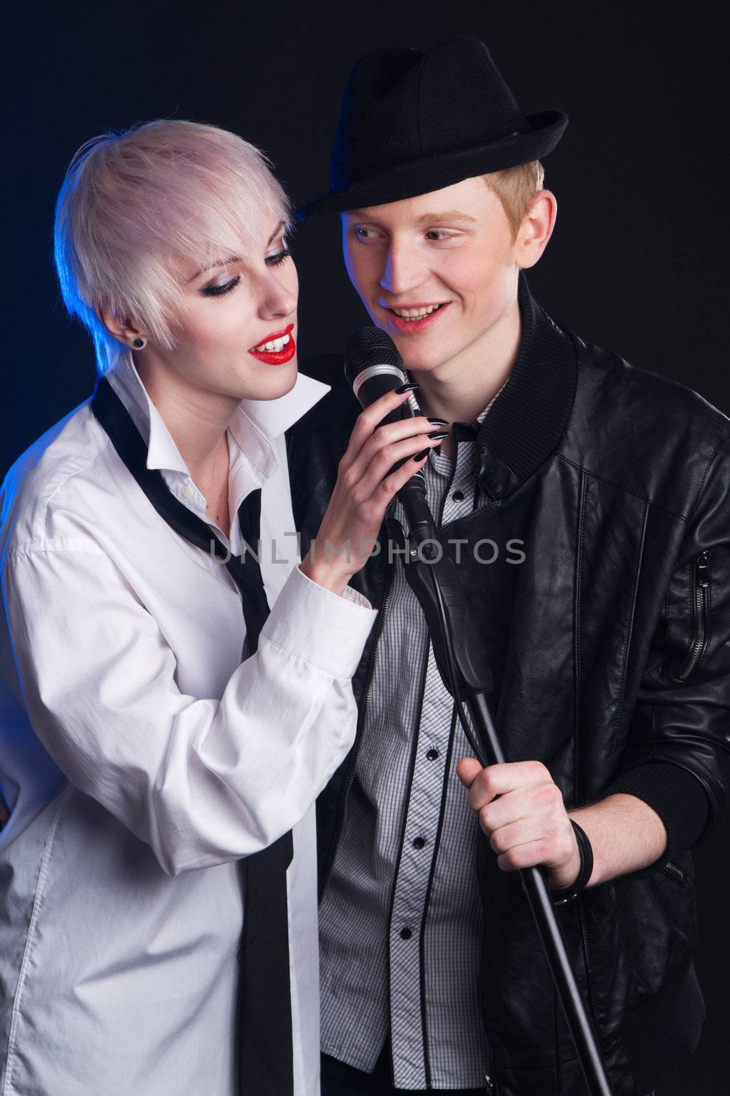 Teenage rock band against white background