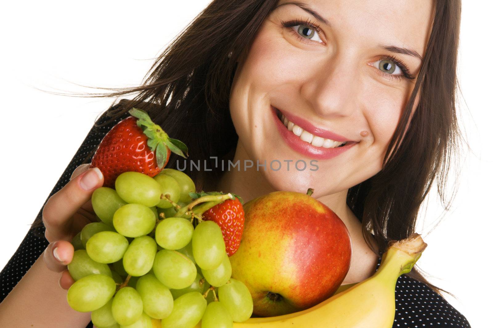 Beautiful young woman with a bunch of fruits by Gdolgikh