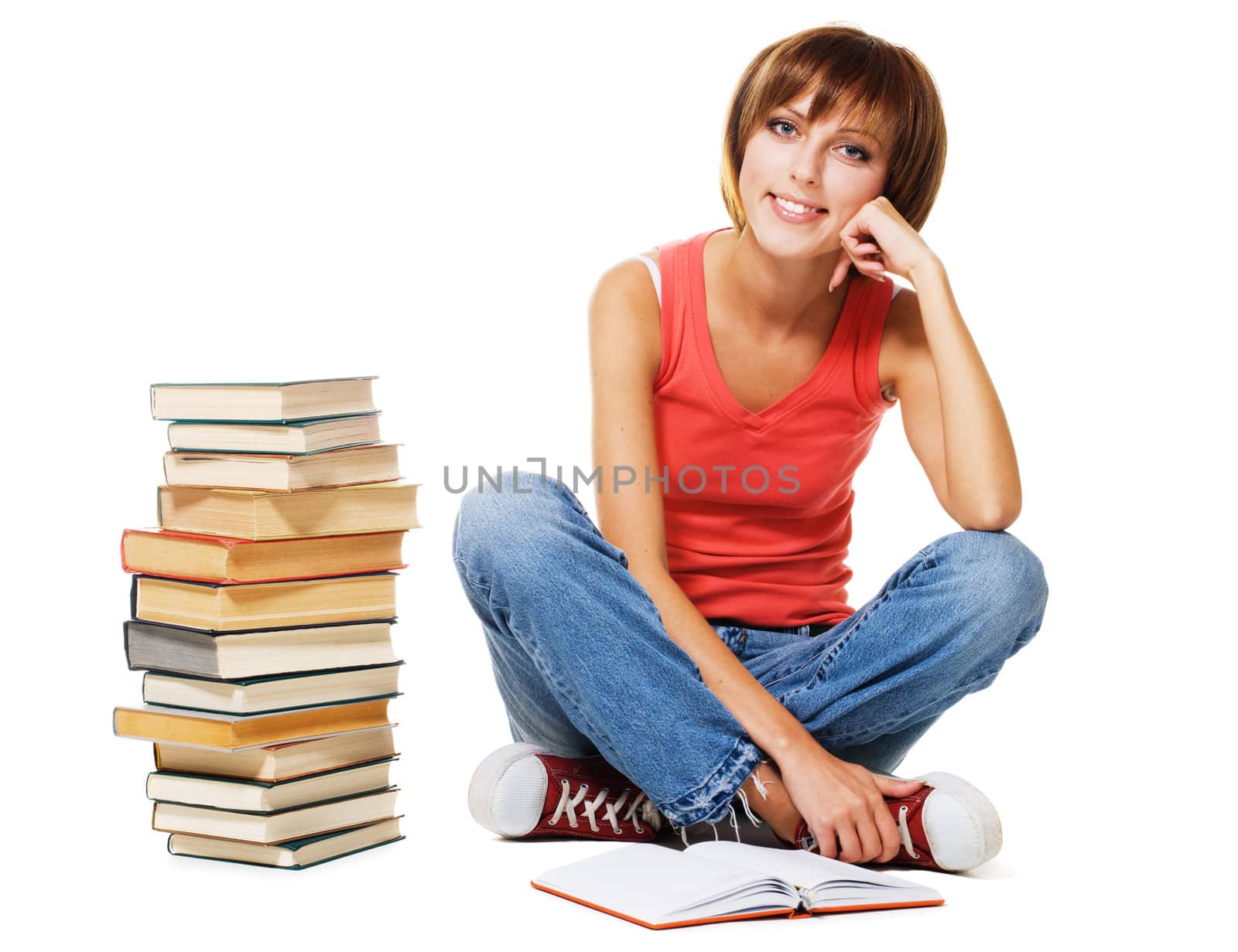 Lovely student with a stack of books, isolated on white